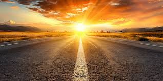 download (78) Paisagem com uma estrada ao pôr do sol, representando entrega e direção divina.