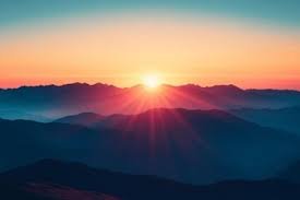 download (3) horizonte iluminado pelo nascer do sol, simbolizando novos começos e esperança.