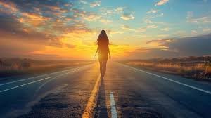 download (7) Pessoa caminhando por uma estrada ao pôr do sol, simbolizando perseverança e fidelidade.